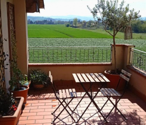 Bilocale tra città e colline.